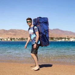 Gladiator Elite Race 12'6 X 26" Paddleboard 2023 -Surfing Equipment Shop gladiator elite bag front with male model 9 1