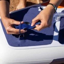 Gladiator Elite 11'2 X 30" Paddleboard 2023 -Surfing Equipment Shop gladiator elite putting leash on board