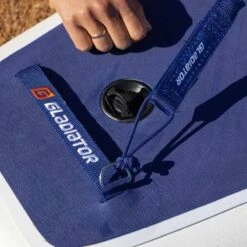 Gladiator Elite R Kids 10'6 X 24" Paddleboard 2023 -Surfing Equipment Shop gladiator elite putting leash on board 3 1