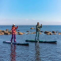 Gladiator Pro 11'6 X 34" Paddleboard 2023 -Surfing Equipment Shop sq 11 2 11 6 paddleing on water winter 1