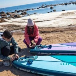 Gladiator Pro 10'6 X 32" Paddleboard 2023 -Surfing Equipment Shop sq winter 10 6 11 2 putting leash on